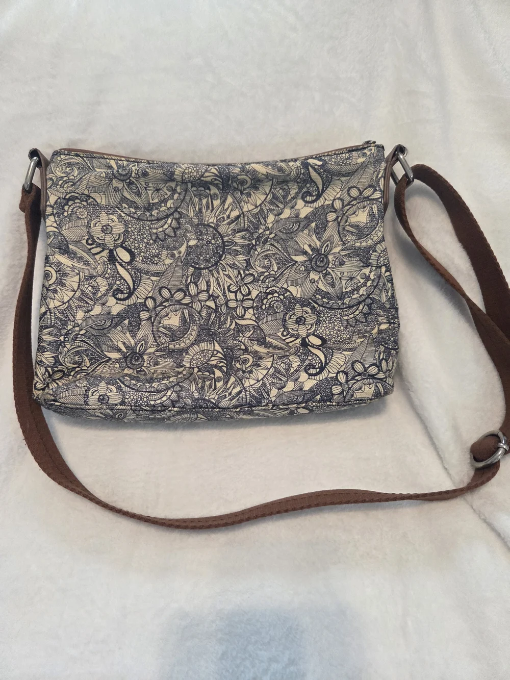Sakroots Floral Crossbody Bag in Cream with Brown Strap